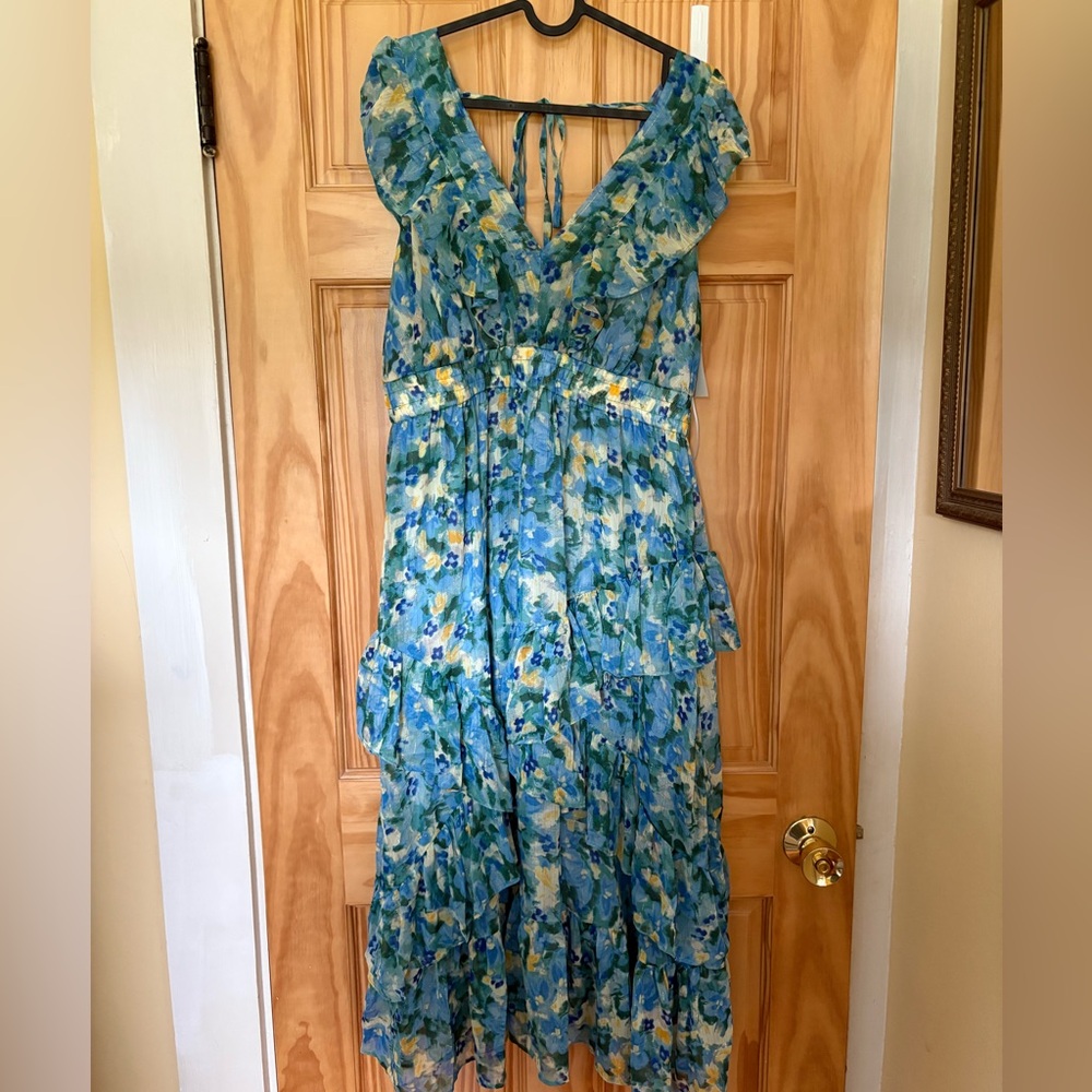 Floral tiered dress summer wedding guest blues and greens